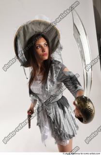 LUCI_AVIOL STANDING POSE WITH GUN AND SWORD